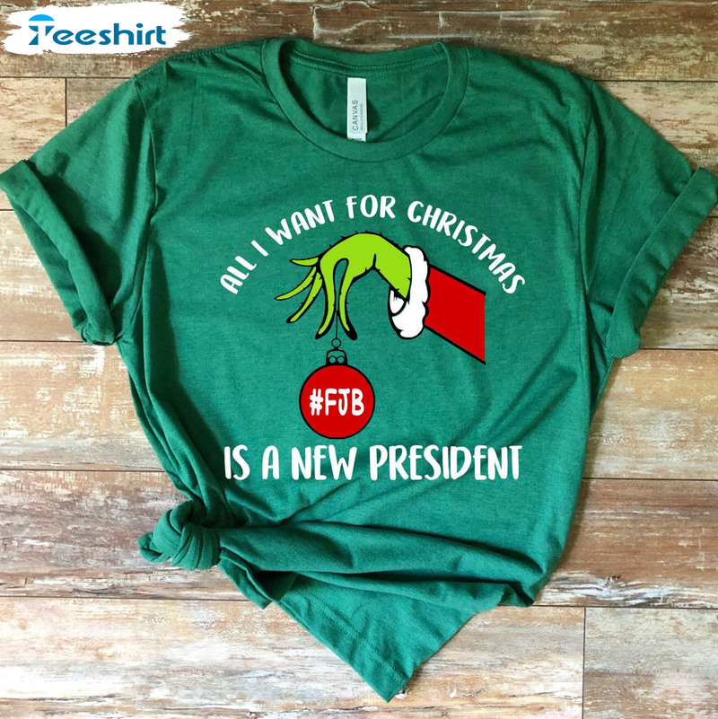 All I Want For Christmas Is A New President Shirt, Grinch Hand Christmas Sweatshirt Hoodie