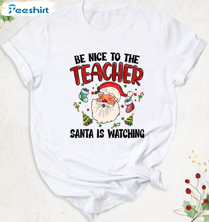 Be Nice To Teacher Santa Is Watching Shirt – Christmas Sant Claus Unisex Hoodie Long Sleeve