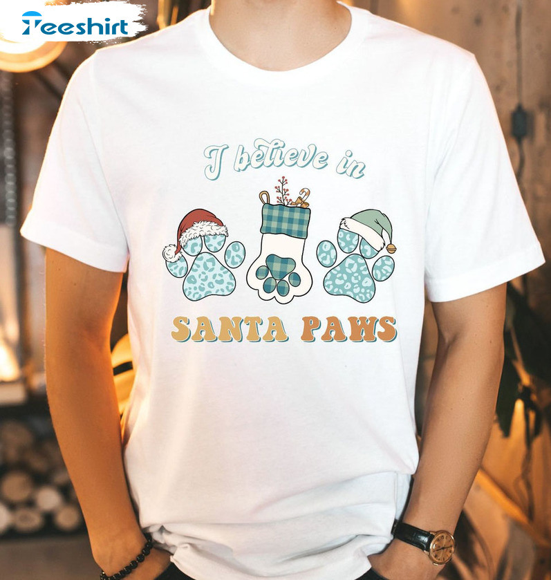 I Believe In Santa Paws Shirt – Groovy Christmas Dog Sweater Unisex T-shirt