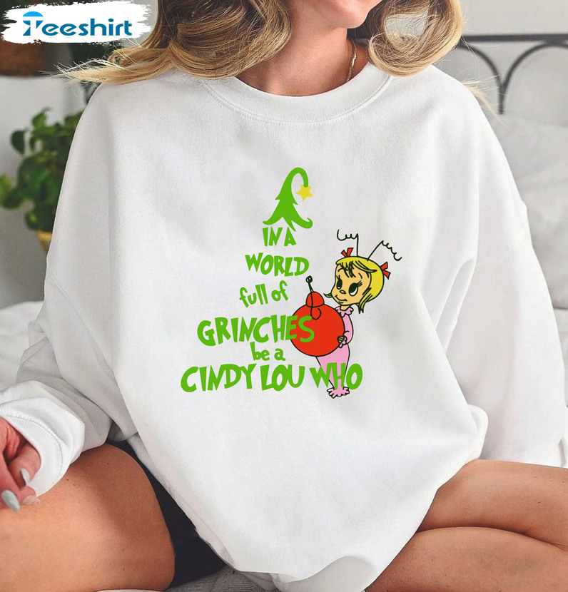 In A World Full Of Grinches Be A Griswold Shirt, Christmas Short Sleeve Unisex T-shirt