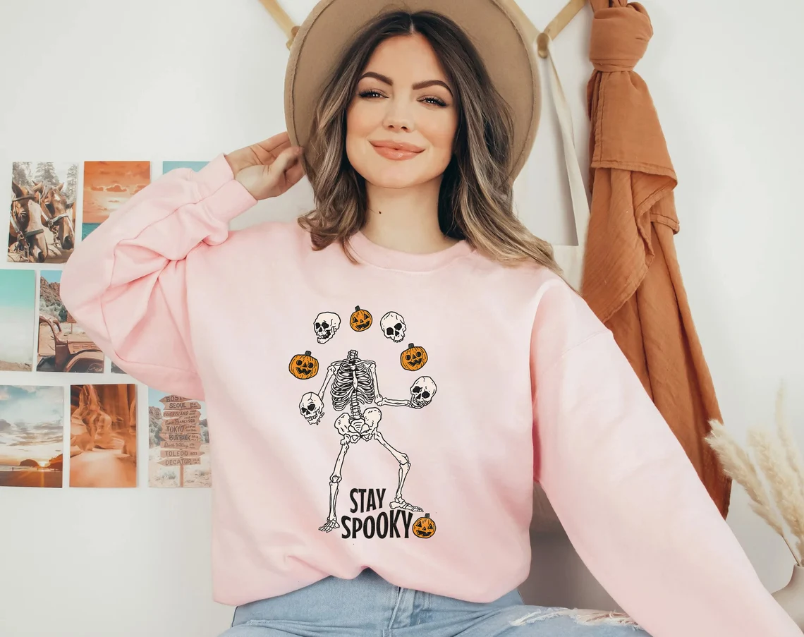 Retro Pumpkin Skeleton Juggling Sweatshirt