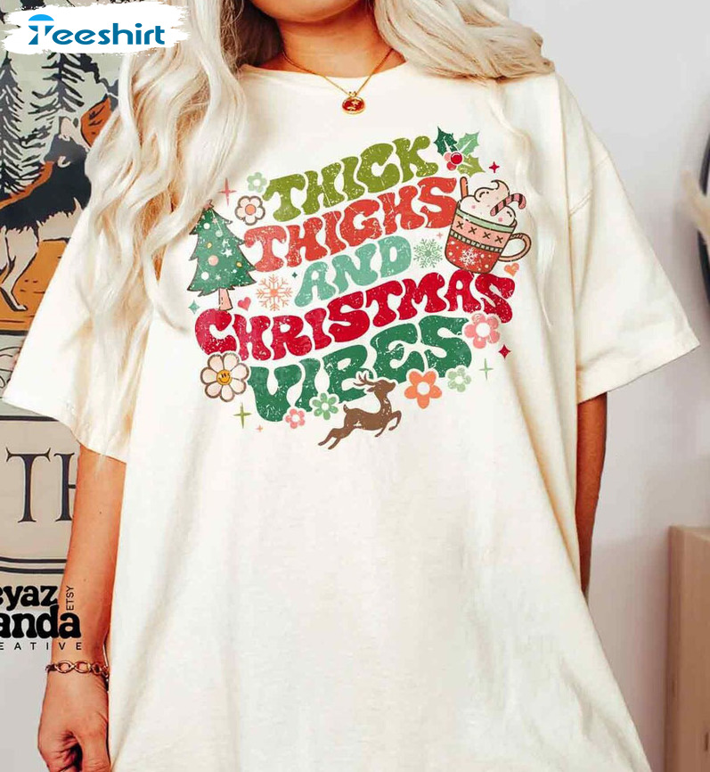 Thick Thighs Christmas Vibes Shirt – Groovy Christmas Trendy Unisex Hoodie